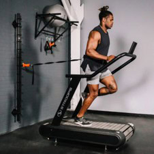 Photo of a man using a Stroops Optimill Motorless Treadmill
